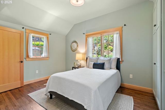 17367 Canal Cir, Lake Oswego, OR 97035 - bedroom featuring multiple windows, lofted ceiling, wood finished floors, and baseboards