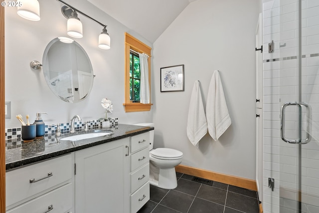 17367 Canal Cir, Lake Oswego, OR 97035 - bathroom with vanity, a shower stall, lofted ceiling, toilet, and tile patterned flooring