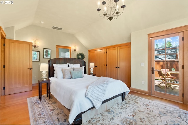 17367 Canal Cir, Lake Oswego, OR 97035 - bedroom with access to outside, lofted ceiling, light wood-style flooring, a chandelier, and baseboards