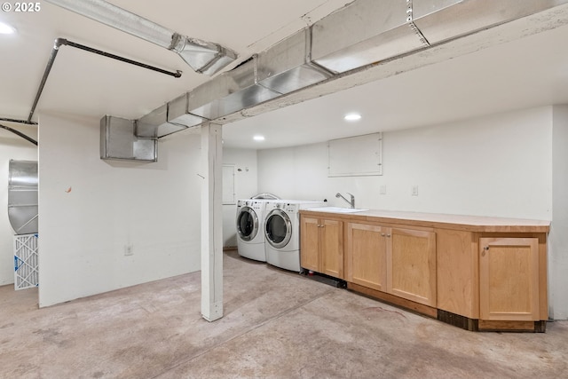 17367 Canal Cir, Lake Oswego, OR 97035 - laundry room with washing machine and clothes dryer, cabinet space, and recessed lighting