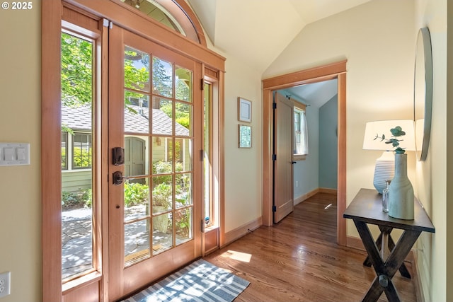 17367 Canal Cir, Lake Oswego, OR 97035 - entryway featuring plenty of natural light, light wood-style floors, lofted ceiling, and baseboards