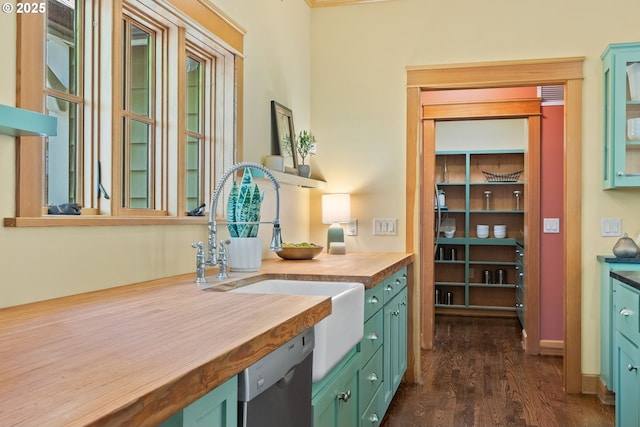 17367 Canal Cir, Lake Oswego, OR 97035 - kitchen featuring stainless steel dishwasher, green cabinetry, a sink, wood counters, and dark wood finished floors