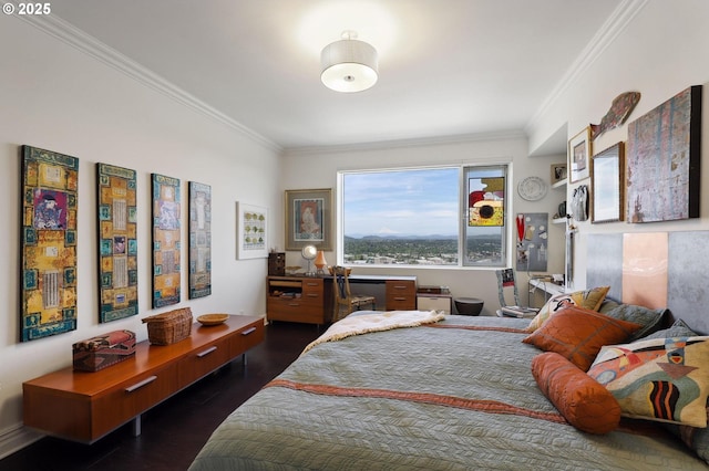 bedroom with ornamental molding and dark wood-style floors