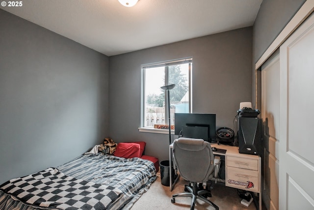 bedroom featuring dark colored carpet