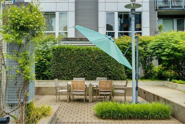 exterior space with outdoor dining area