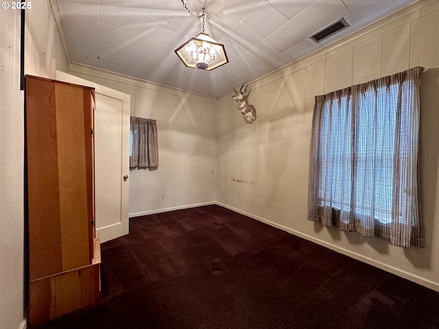 808 F Ave, La Grande, OR 97850 - empty room with dark carpet and baseboards