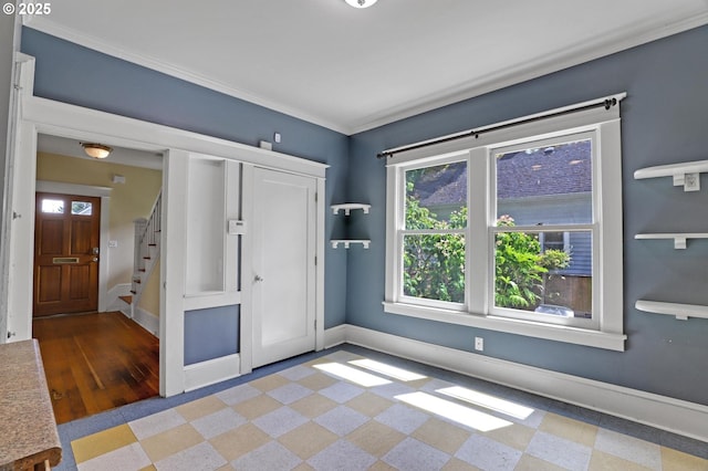 3607 NE 13th Ave, Portland, OR 97212 - foyer entrance with plenty of natural light, baseboards, and stairs