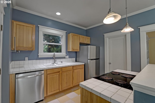 3607 NE 13th Ave, Portland, OR 97212 - kitchen featuring stainless steel appliances, a sink, tile countertops, crown molding, and hanging light fixtures