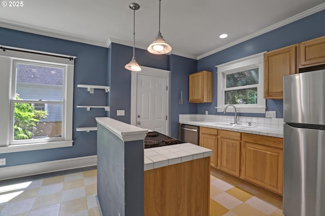 3607 NE 13th Ave, Portland, OR 97212 - kitchen with stainless steel appliances, a sink, light flooring, a kitchen island, and crown molding