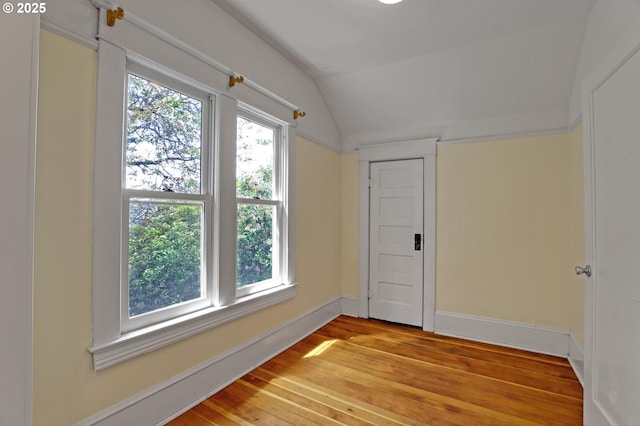 3607 NE 13th Ave, Portland, OR 97212 - unfurnished room featuring light wood-type flooring, lofted ceiling, and baseboards
