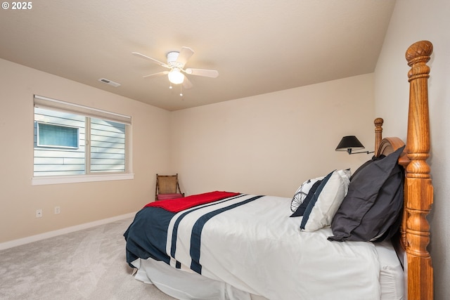 bedroom with light colored carpet and ceiling fan