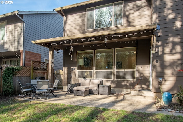 back of house with a patio