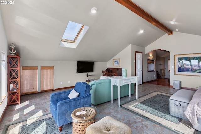 living area with a skylight and baseboards