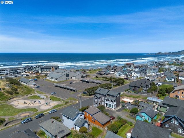 aerial view of residential area with a nearby body of water
