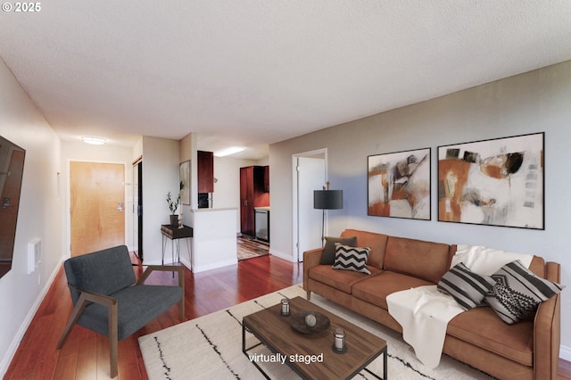2020 SW Main St Unit 403, Portland, OR 97205 - living area with wood finished floors and baseboards