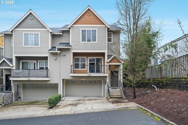 view of front of house featuring driveway and a garage