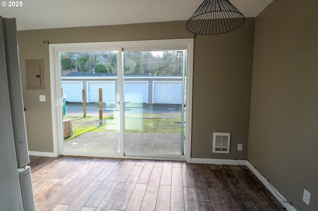 doorway featuring hardwood / wood-style floors and electric panel