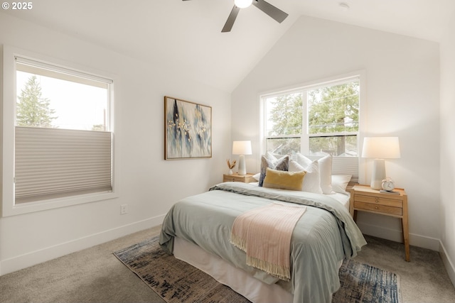 bedroom featuring carpet, multiple windows, baseboards, and vaulted ceiling