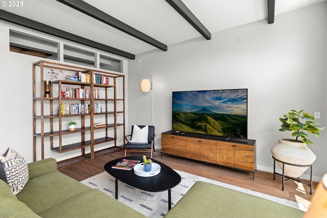 323 NW 13th Ave Unit 404, Portland, OR 97209 - living area with beam ceiling and wood finished floors