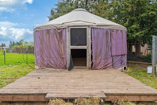view of outdoor structure with an outdoor structure and fence
