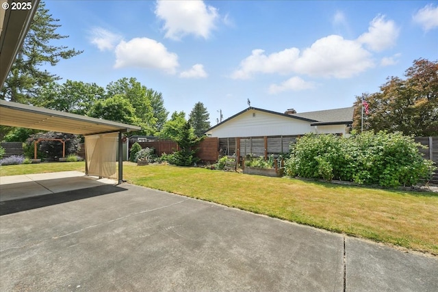 3002 17th Ave, Forest Grove, OR 97116 - view of yard featuring a carport and concrete driveway