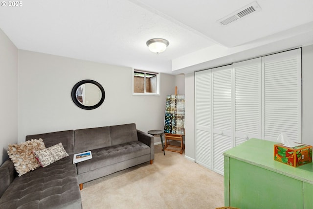 living area with carpet and baseboards