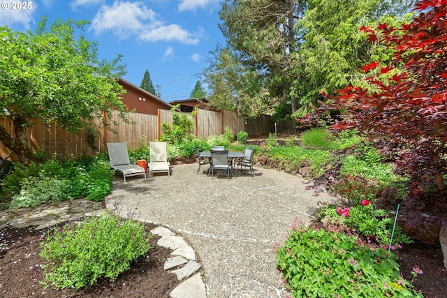 view of patio / terrace with fence and outdoor dining space