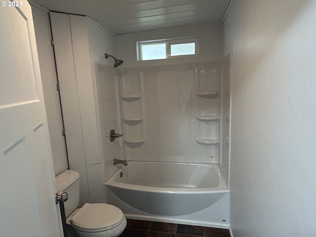 bathroom featuring shower / bath combination and toilet