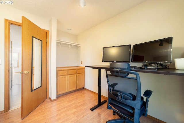 12015 SE Regal Ct, Clackamas, OR 97015 - home office with light wood-style floors and baseboards