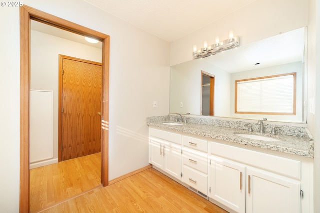 12015 SE Regal Ct, Clackamas, OR 97015 - full bath featuring wood finished floors and double vanity