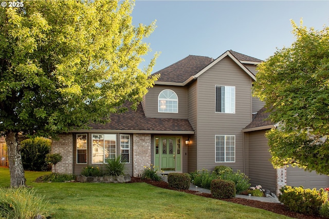 12015 SE Regal Ct, Clackamas, OR 97015 - traditional-style house featuring a front yard and roof with shingles