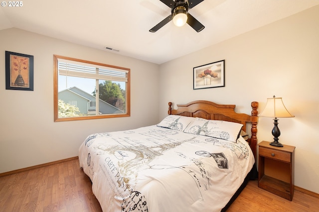 12015 SE Regal Ct, Clackamas, OR 97015 - bedroom featuring light wood-type flooring, a ceiling fan, and lofted ceiling