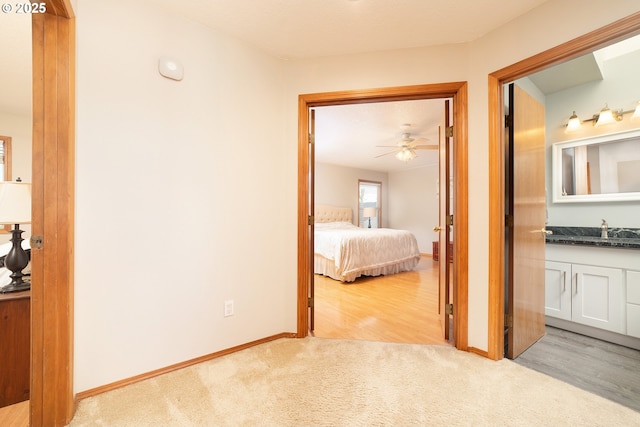 12015 SE Regal Ct, Clackamas, OR 97015 - corridor with carpet and a sink