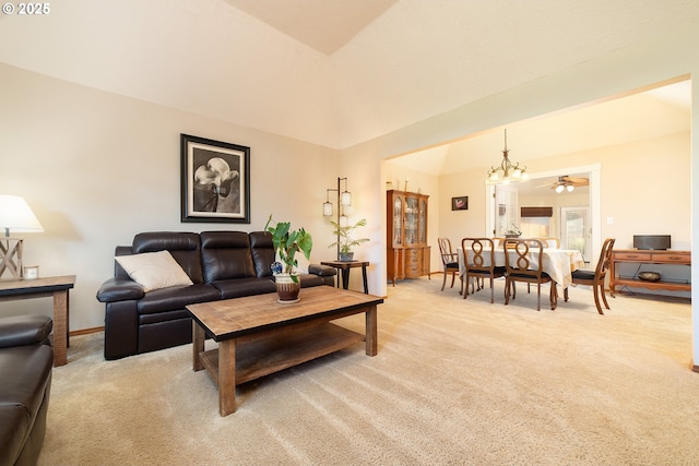 12015 SE Regal Ct, Clackamas, OR 97015 - living area with light colored carpet, a chandelier, and lofted ceiling
