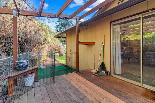 wooden terrace featuring a pergola