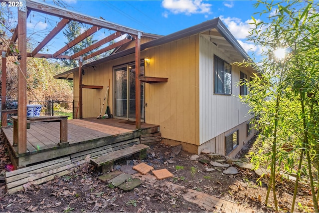 view of home's exterior with a deck