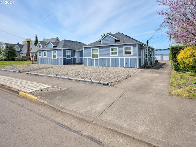 178 S Main St, Lebanon, OR 97355 - view of front of house featuring a shingled roof