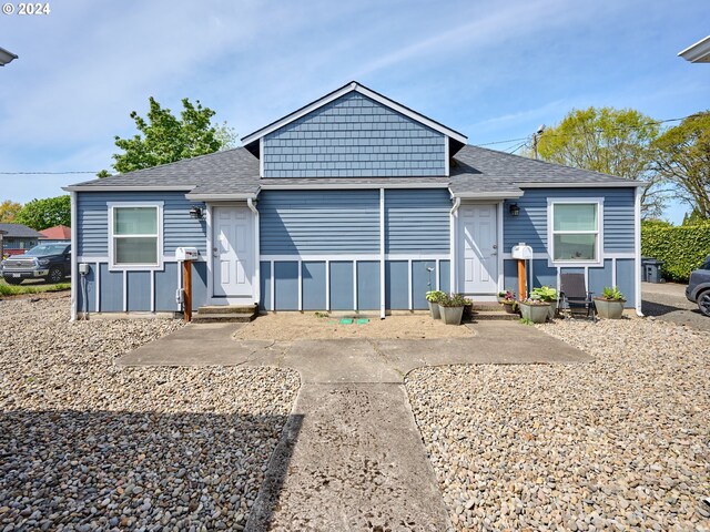 178 S Main St, Lebanon, OR 97355 - view of front of home with a shingled roof