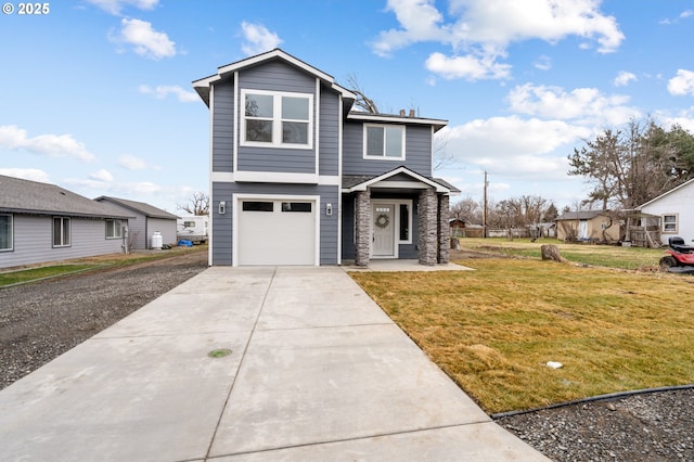 front facade featuring a garage and a front lawn