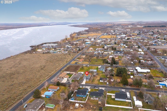 bird's eye view with a water view