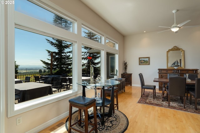 20700 SE Cherry Blossom Ln, Amity, OR 97101 - dining room featuring light wood-style flooring and ceiling fan