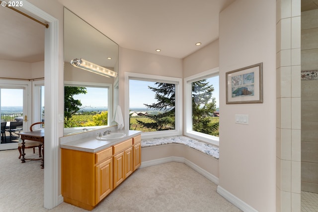 20700 SE Cherry Blossom Ln, Amity, OR 97101 - full bath with healthy amount of natural light, vanity, a tile shower, and recessed lighting