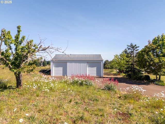 20700 SE Cherry Blossom Ln, Amity, OR 97101 - view of yard with a garage and an outbuilding