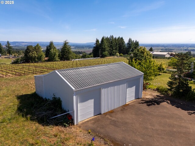 20700 SE Cherry Blossom Ln, Amity, OR 97101 - detached garage featuring a view of countryside
