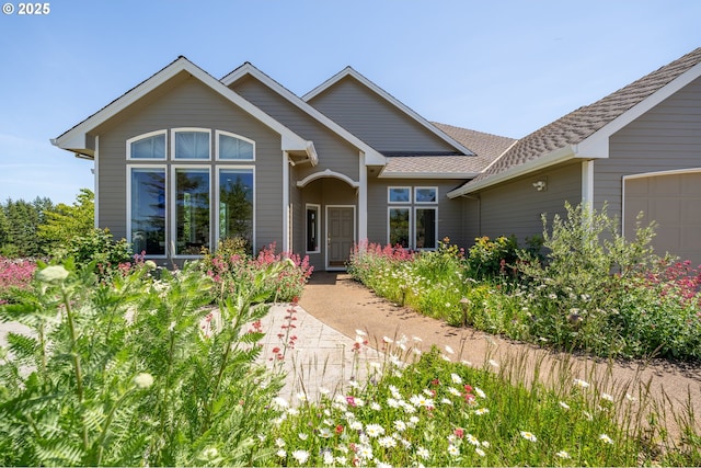 20700 SE Cherry Blossom Ln, Amity, OR 97101 - view of front of home featuring an attached garage and a shingled roof