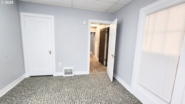 315 N Gale St, Heppner, OR 97836 - carpeted empty room with a drop ceiling and a smoke detector
