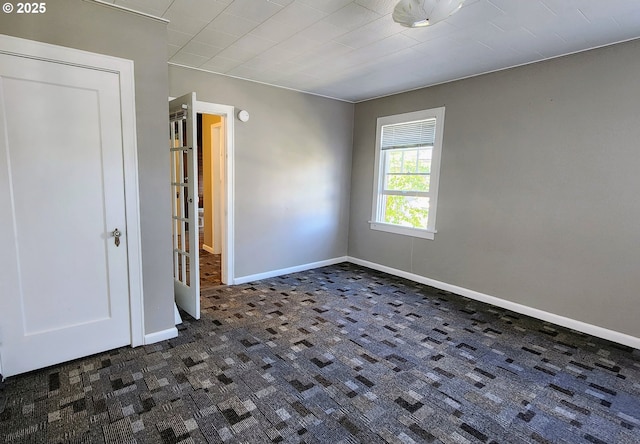 315 N Gale St, Heppner, OR 97836 - unfurnished bedroom with dark colored carpet and baseboards