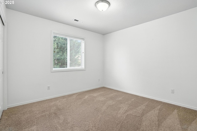 2137 N Q St, Washougal, WA 98671 - empty room featuring carpet flooring and baseboards