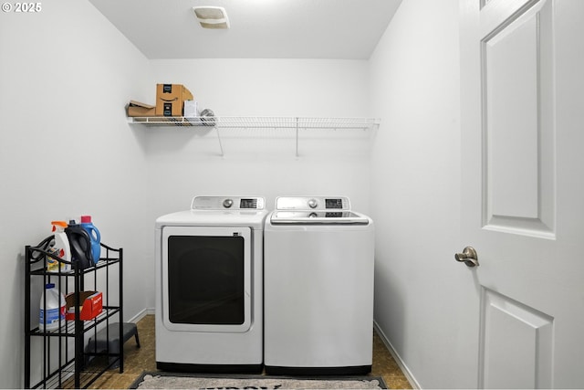 2137 N Q St, Washougal, WA 98671 - laundry area featuring washer and clothes dryer and baseboards