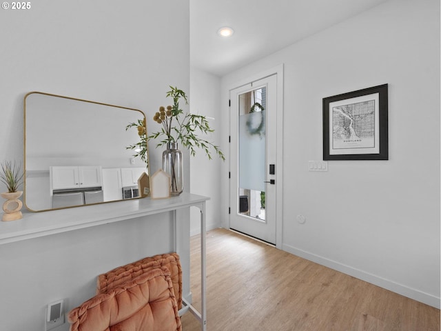 foyer featuring light wood-type flooring